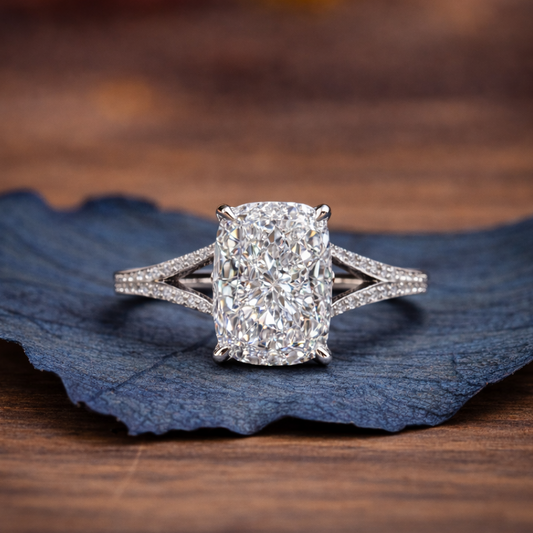 Diamond ring on a blue leaf with a blurred 